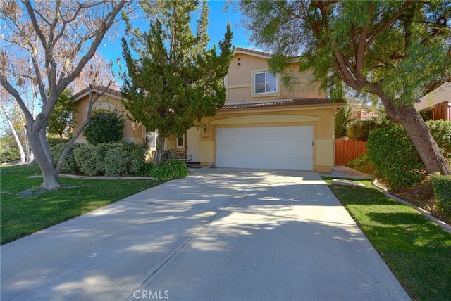 view of front of home featuring stucco siding, concrete driveway, an attached garage, fence, and a tiled roof