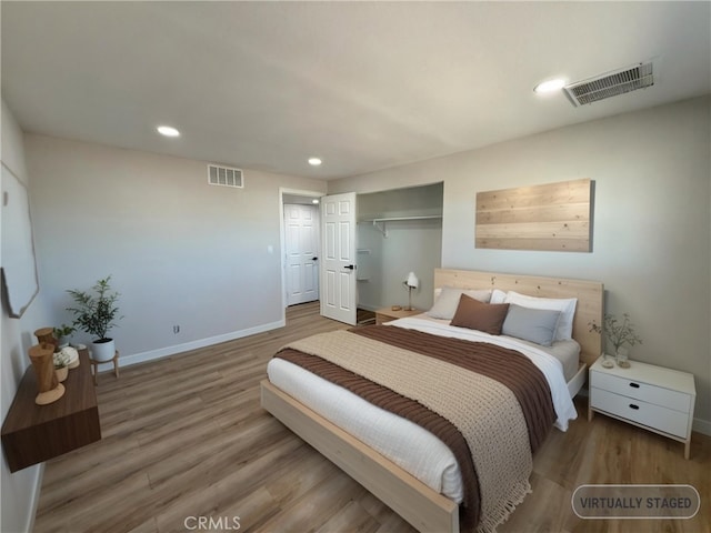 420 N Yorktown St, Ridgecrest, CA 93555 - bedroom featuring baseboards, wood finished floors, visible vents, and recessed lighting