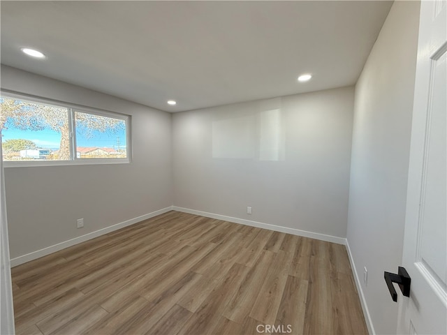 420 N Yorktown St, Ridgecrest, CA 93555 - empty room featuring light wood-type flooring, baseboards, and recessed lighting