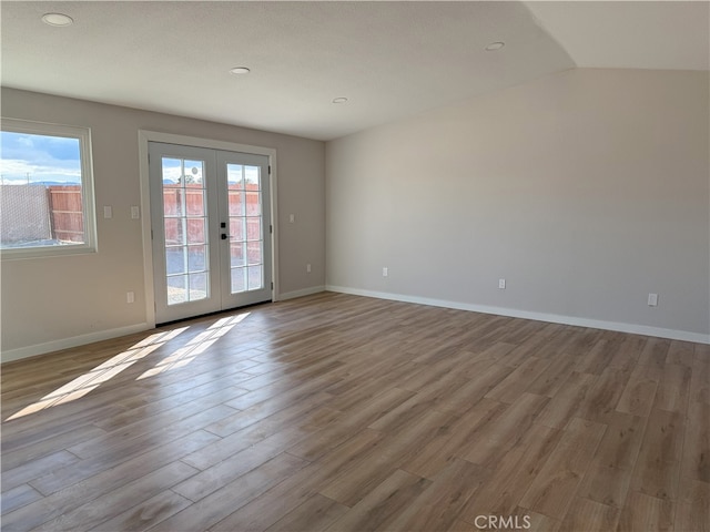 420 N Yorktown St, Ridgecrest, CA 93555 - spare room with french doors, plenty of natural light, and wood finished floors