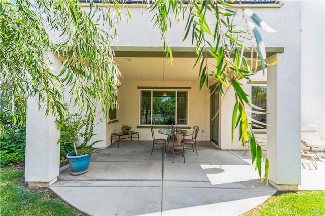 view of patio with outdoor dining area