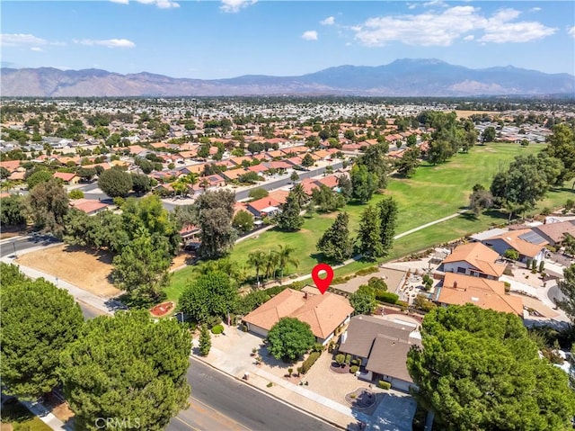 drone / aerial view featuring a mountain view and a residential view