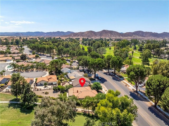 drone / aerial view featuring a residential view and a mountain view