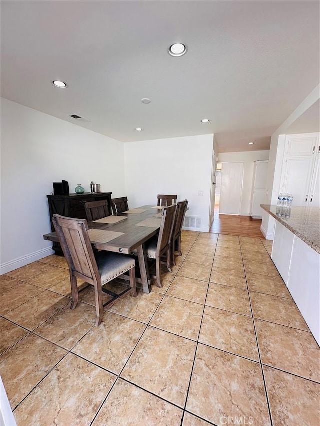 25501 Sand Creek Trl, Moreno Valley, CA 92557 - dining area with light tile patterned flooring, visible vents, recessed lighting, and baseboards