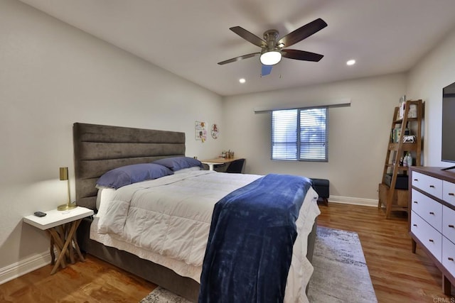 bedroom featuring recessed lighting, ceiling fan, baseboards, and wood finished floors