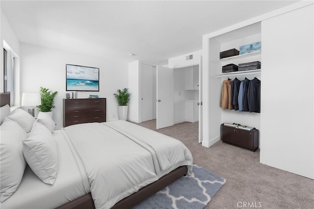 bedroom featuring carpet and visible vents