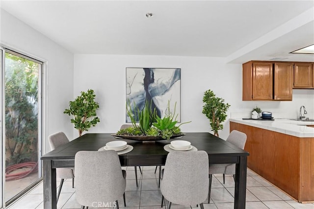 dining space with light tile patterned floors