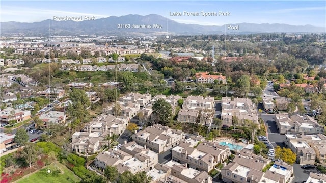 birds eye view of property featuring a residential view and a mountain view