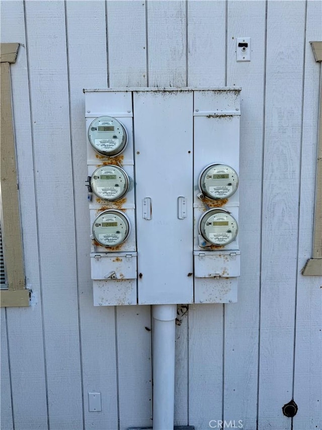 details with board and batten siding and electric meter