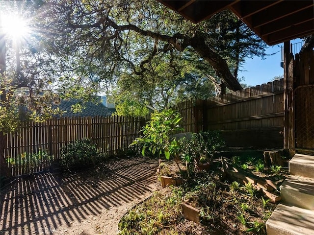 view of yard featuring a fenced backyard