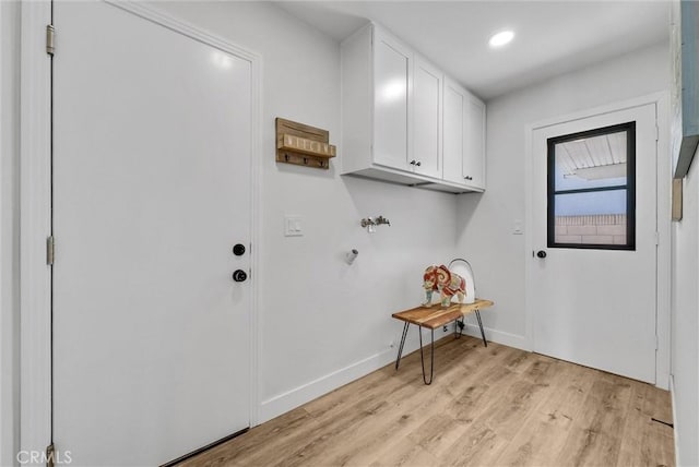 laundry room with washer hookup, recessed lighting, cabinet space, light wood-type flooring, and baseboards