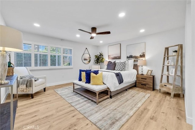 bedroom with baseboards, ceiling fan, wood finished floors, and recessed lighting