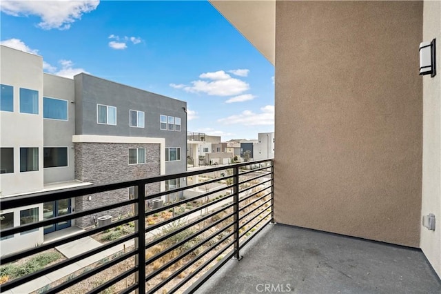 balcony featuring a residential view