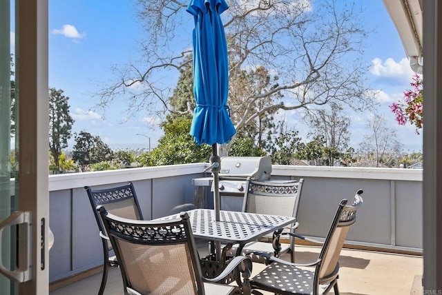 balcony with outdoor dining area