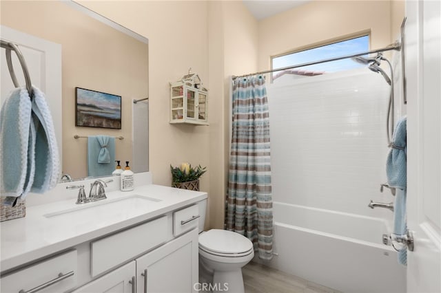 full bathroom featuring vanity, toilet, shower / tub combo, and wood finished floors