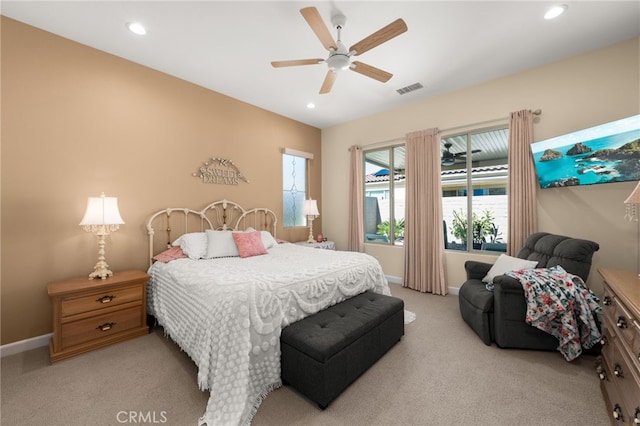 bedroom with recessed lighting, visible vents, baseboards, and light colored carpet