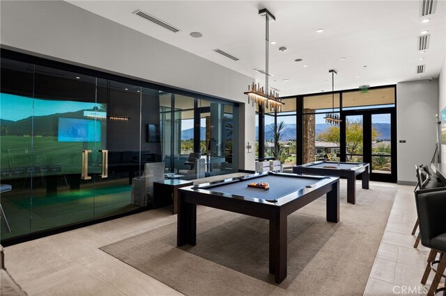 playroom with visible vents, plenty of natural light, and french doors