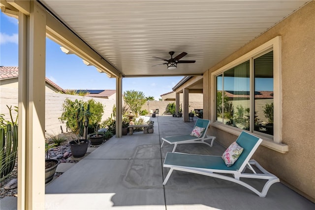 view of patio with a ceiling fan and a fenced backyard