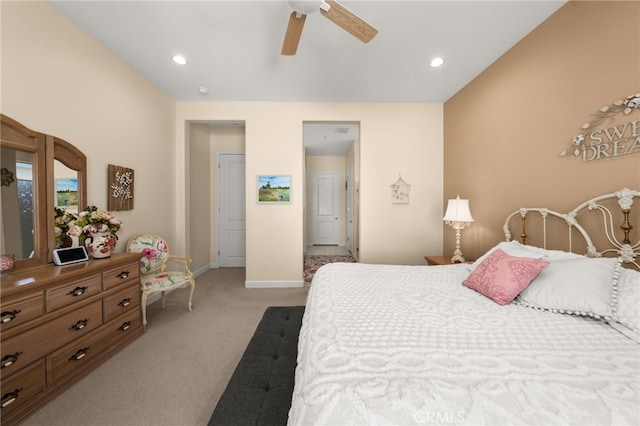 bedroom featuring ceiling fan, recessed lighting, baseboards, and light carpet