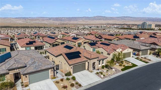 bird's eye view with a mountain view and a residential view