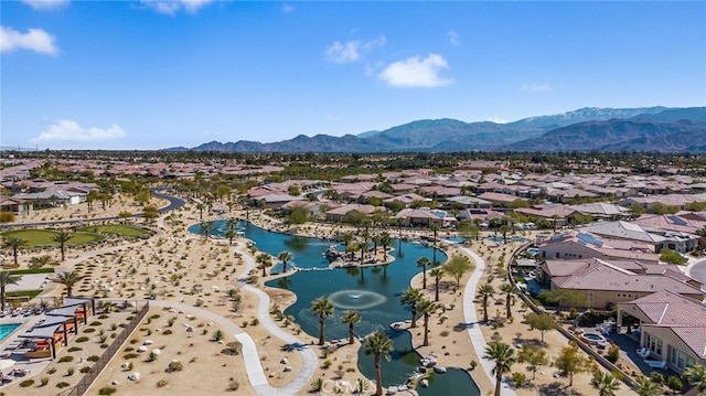 bird's eye view with a residential view and a water and mountain view