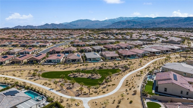 drone / aerial view featuring a mountain view and a residential view