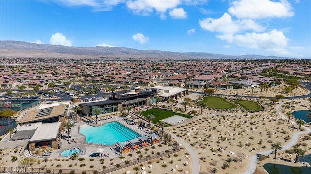 birds eye view of property featuring a mountain view and a residential view