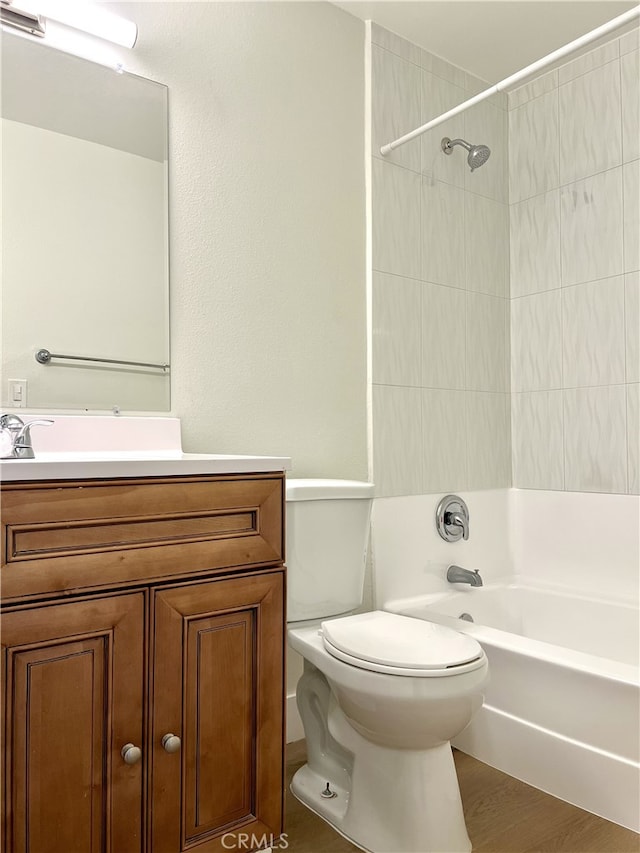 700 W La Veta # A4, Orange, CA 92868 - bathroom featuring toilet, bathing tub / shower combination, vanity, and wood finished floors