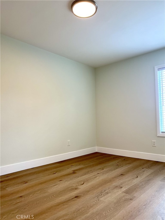 700 W La Veta # A4, Orange, CA 92868 - spare room featuring baseboards and wood finished floors