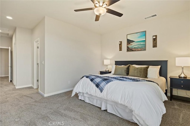 carpeted bedroom featuring a ceiling fan, recessed lighting, baseboards, and visible vents