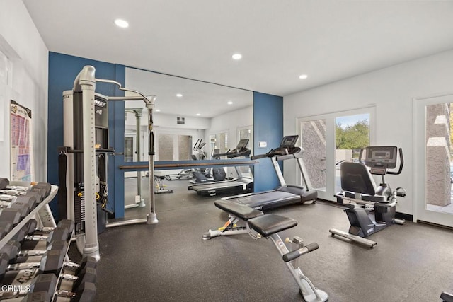 gym with baseboards and recessed lighting