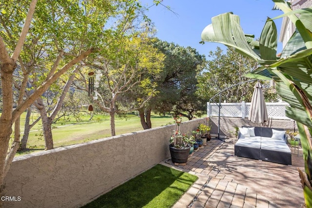 view of patio with fence