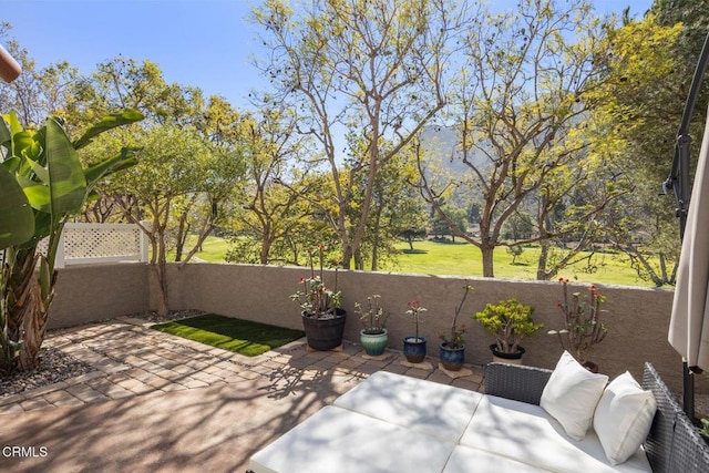 view of patio / terrace with a balcony