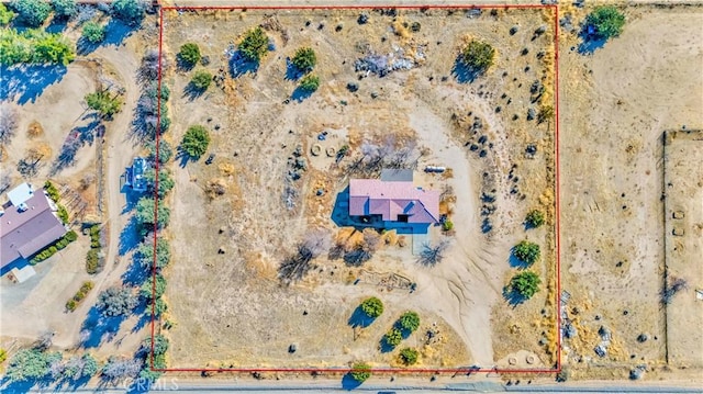 drone / aerial view with a desert view