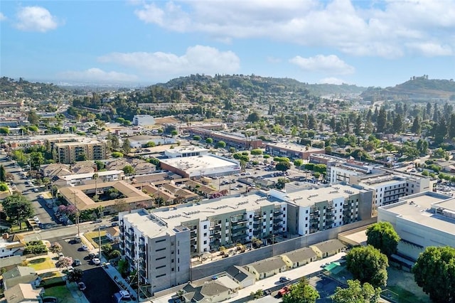 birds eye view of property featuring a city view