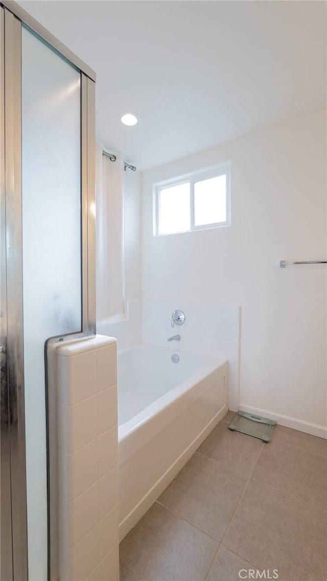 full bathroom with baseboards, a tub, tile patterned floors, a shower with shower door, and recessed lighting