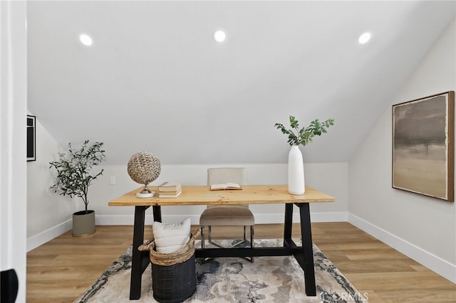 office space featuring recessed lighting, light wood-type flooring, and baseboards