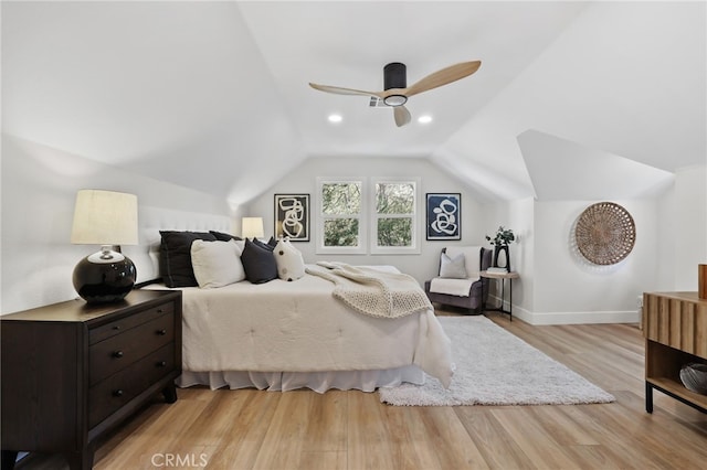 bedroom with recessed lighting, a ceiling fan, baseboards, vaulted ceiling, and light wood-type flooring