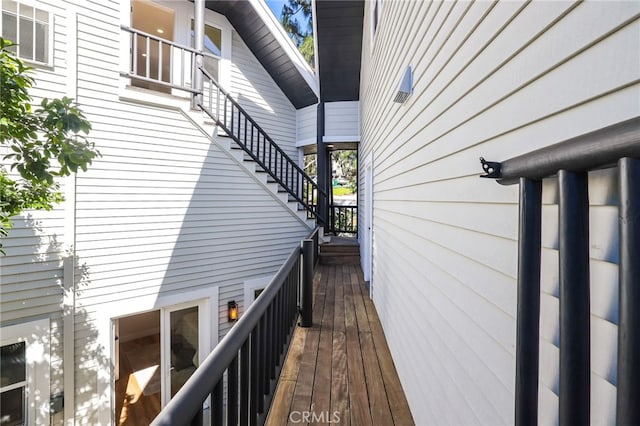 wooden deck featuring stairway