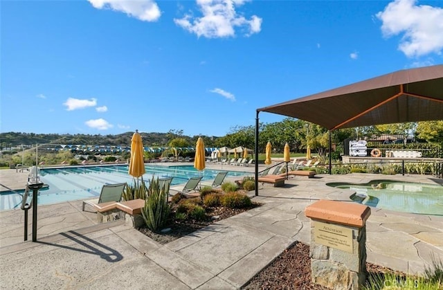 community pool featuring a patio