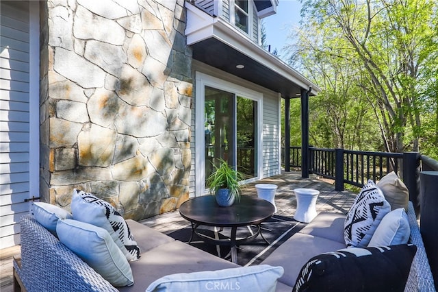 view of patio / terrace featuring a deck and an outdoor hangout area