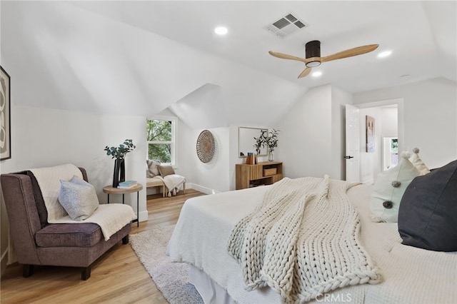 bedroom with lofted ceiling, light wood-style flooring, recessed lighting, visible vents, and a ceiling fan