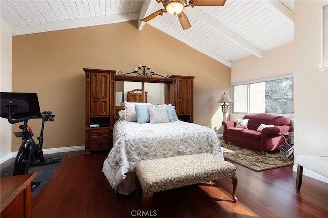 bedroom with beamed ceiling, wood finished floors, and baseboards