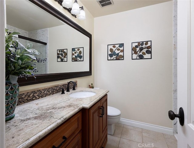 full bath with tile patterned flooring, toilet, vanity, visible vents, and a stall shower