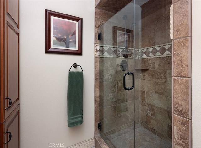 full bathroom with a stall shower