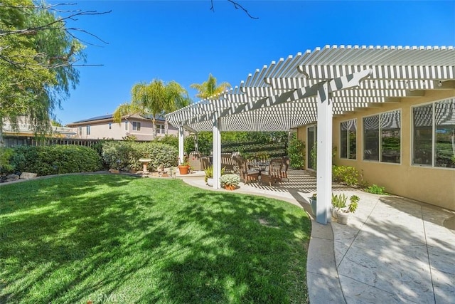 view of yard with fence, a pergola, and a patio area