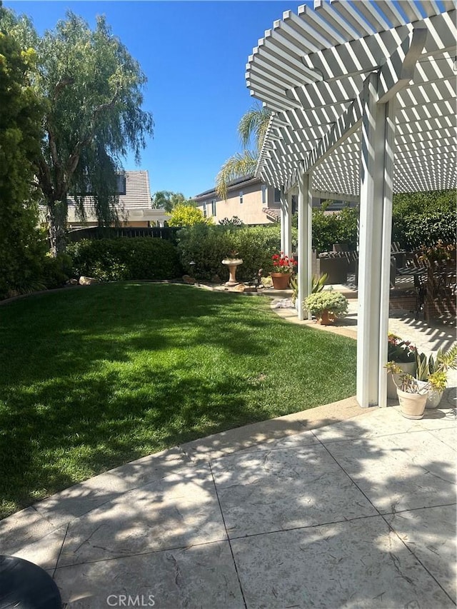 view of yard featuring a pergola and a patio area