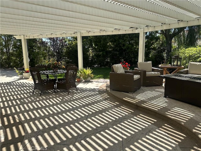 view of patio / terrace with a pergola and outdoor dining area