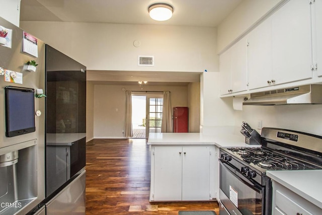 kitchen featuring under cabinet range hood, visible vents, white cabinets, gas range oven, and smart refrigerator