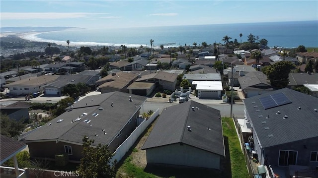 aerial view featuring a water view and a residential view